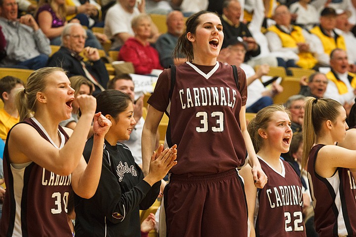 SHAWN GUST/Press

Amanda Carlton joins her team in celebration as the Cardinals score in the second half.