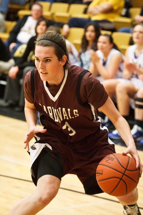 SHAWN GUST/Press

Amanda Carlton dribbles toward the baseline to set up a score in the Region 18 tournament.