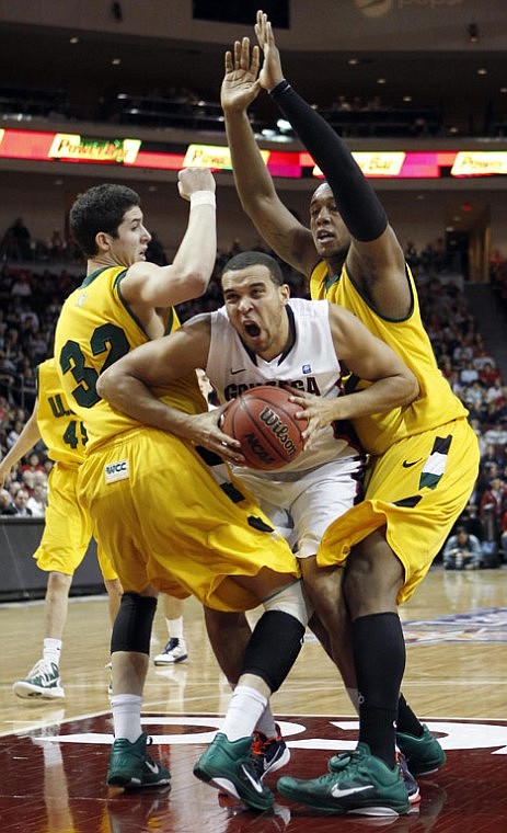 &lt;p&gt;Gonzaga forward Elias Harris drives past San Francisco forwards Angelo Caloiaro, left, and Perris Blackwell during the semifinals of the West Coast Conference tournament Sunday in Las Vegas.&lt;/p&gt;