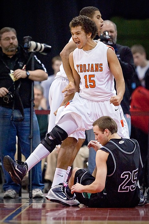 &lt;p&gt;Post Falls High's Malcolm Colbert celebrates after drawing a foul from Jordan Thompson from Eagle High.&lt;/p&gt;
