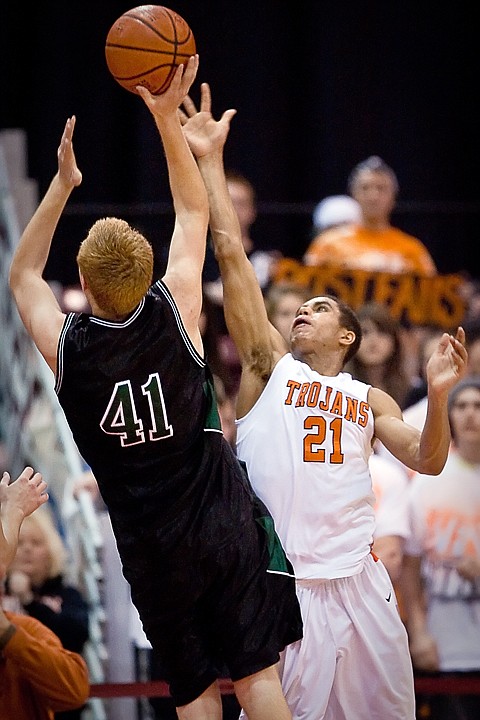 &lt;p&gt;Post Falls High's Shawn Reid goes up for a block on Josh Thibault from Eagle High during the first half.&lt;/p&gt;