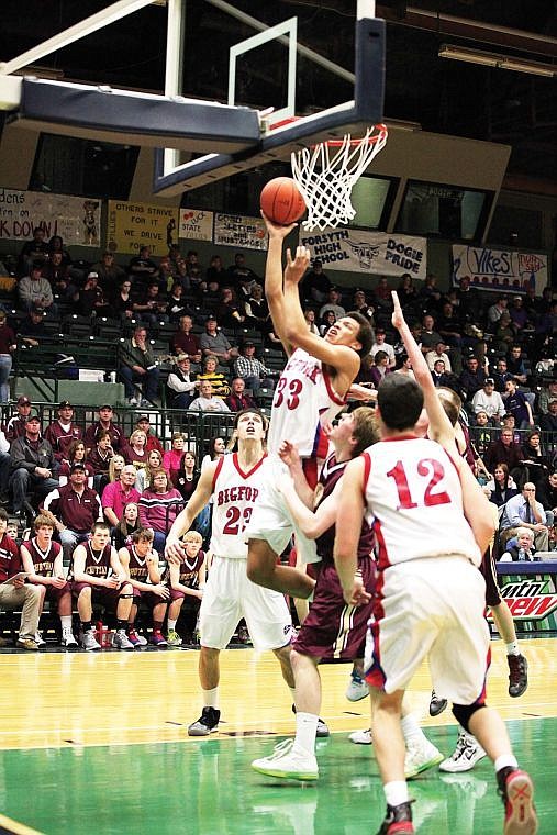 &lt;p&gt;&lt;strong&gt;Bigfork forward&lt;/strong&gt; Christian Evans (33) goes up for a shot as teammates Cameron Nissen (23) and Colter Trent look on Thursday during the Viking's opening-round win over Choteau at the Class B State Basketball Tournament in Butte.&lt;/p&gt;