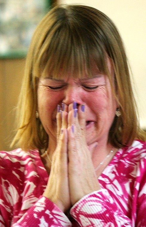 Gaye Sheldon becomes emotional while sharing in front of the congregation.