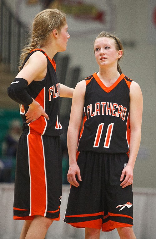 &lt;p&gt;Flathead junior Emma Andrews (10) and Flathead senior Dani Davis (11) talk during a free throw Friday afternoon during Flathead's matchup against Billings Senior on the second day of the Class AA state basketball tournament at Four Seasons Arena in Great Falls. Friday, March 8, 2013 in Great Falls, Montana. (Patrick Cote/Daily Inter Lake)&lt;/p&gt;