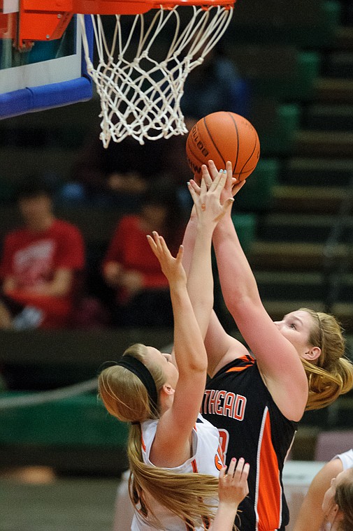 &lt;p&gt;Flathead junior Jenessa Heine (43) puts up a shot Friday afternoon during Flathead's matchup against Billings Senior on the second day of the Class AA state basketball tournament at Four Seasons Arena in Great Falls. Friday, March 8, 2013 in Great Falls, Montana. (Patrick Cote/Daily Inter Lake)&lt;/p&gt;