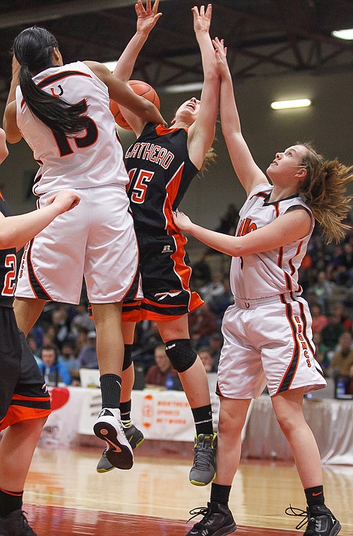 &lt;p&gt;Flathead senior Emily Russell (15) is fouled as she goes up for a shot Friday afternoon during Flathead's matchup against Billings Senior on the second day of the Class AA state basketball tournament at Four Seasons Arena in Great Falls. Friday, March 8, 2013 in Great Falls, Montana. (Patrick Cote/Daily Inter Lake)&lt;/p&gt;