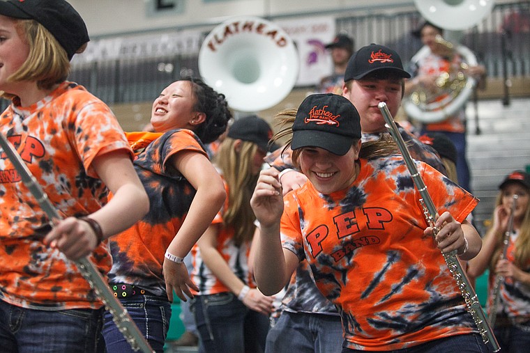 &lt;p&gt;The Flathead High School band dances in-between the third and fourth quarter Friday afternoon during Flathead's matchup against Billings Senior on the second day of the Class AA state basketball tournament at Four Seasons Arena in Great Falls. Friday, March 8, 2013 in Great Falls, Montana. (Patrick Cote/Daily Inter Lake)&lt;/p&gt;