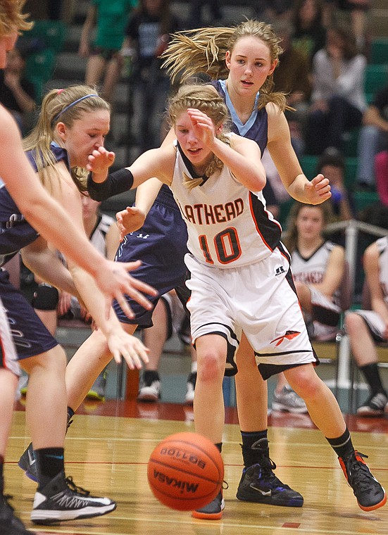 &lt;p&gt;Flathead junior Emma Andrews (10) goes after a loose ball Thursday night during Flathead's matchup against Great Falls High in the first round of the Class AA State Championship in Great Falls. Thursday, March 7, 2013 in Great Falls, Montana. (Patrick Cote/Daily Inter Lake)&lt;/p&gt;