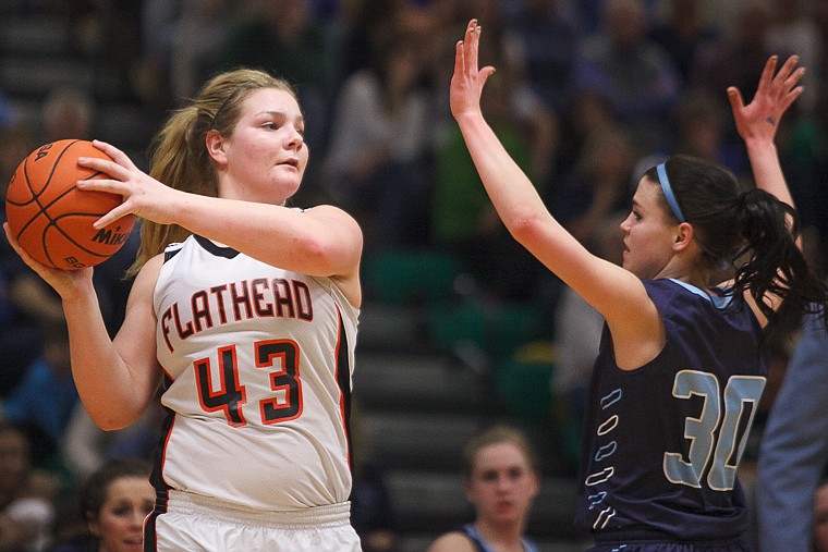 &lt;p&gt;Flathead junior Jenessa Heine (43) looks to pass the ball Thursday night during Flathead's matchup against Great Falls High in the first round of the Class AA State Championship in Great Falls. Thursday, March 7, 2013 in Great Falls, Montana. (Patrick Cote/Daily Inter Lake)&lt;/p&gt;