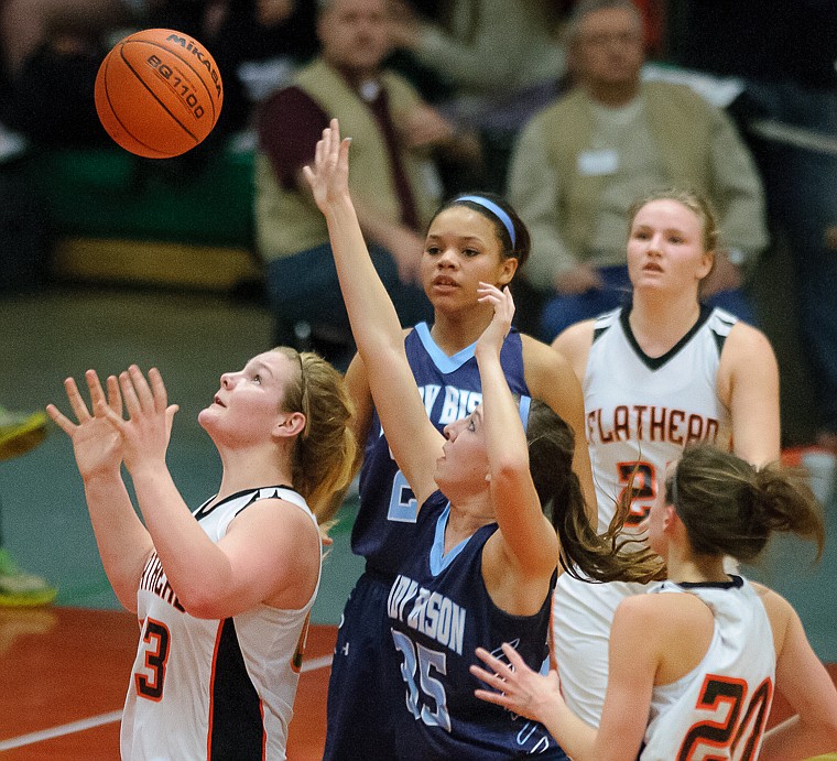 &lt;p&gt;Flathead junior Jenessa Heine (43) eyes the ball for a rebound Thursday night during Flathead's matchup against Great Falls High in the first round of the Class AA State Championship in Great Falls. Thursday, March 7, 2013 in Great Falls, Montana. (Patrick Cote/Daily Inter Lake)&lt;/p&gt;