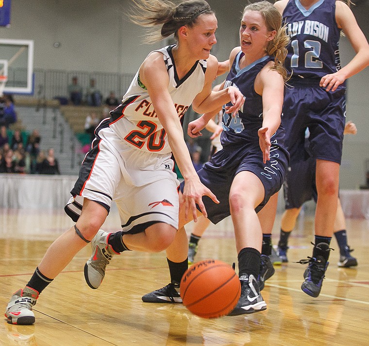 &lt;p&gt;Flathead junior Tana Fountain (20) drives past a defender Thursday night during Flathead's matchup against Great Falls High in the first round of the Class AA State Championship in Great Falls. Thursday, March 7, 2013 in Great Falls, Montana. (Patrick Cote/Daily Inter Lake)&lt;/p&gt;