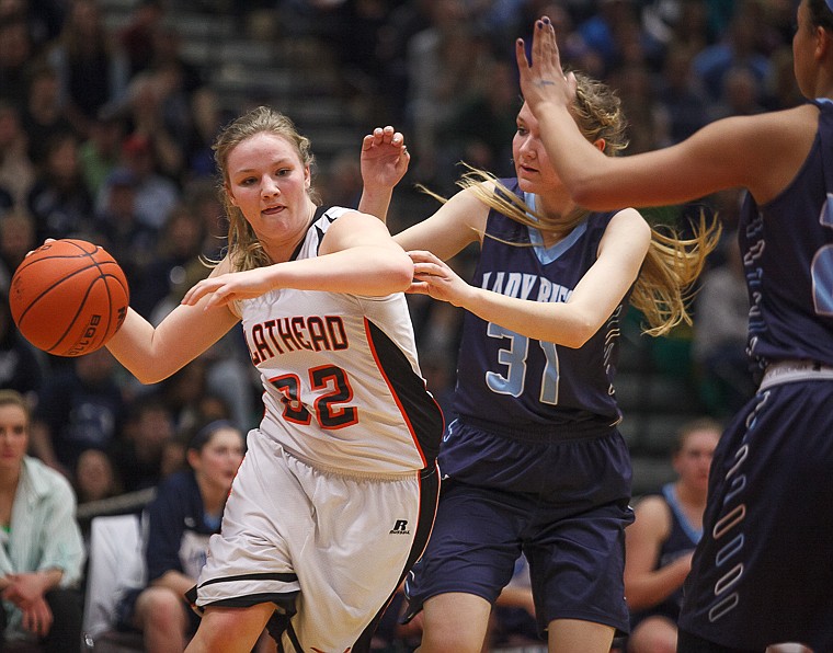 &lt;p&gt;Flathead senior Jessika Abbrescia (22) drives past a defender Thursday night during Flathead's matchup against Great Falls High in the first round of the Class AA State Championship in Great Falls. Thursday, March 7, 2013 in Great Falls, Montana. (Patrick Cote/Daily Inter Lake)&lt;/p&gt;