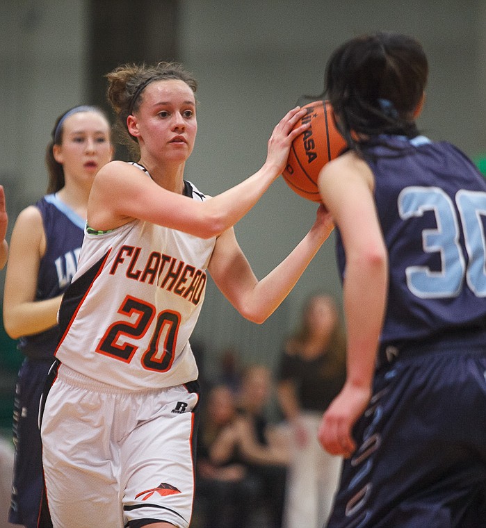 &lt;p&gt;Flathead junior Tana Fountain (20) looks to pass the ball Thursday night during Flathead's matchup against Great Falls High in the first round of the Class AA State Championship in Great Falls. Thursday, March 7, 2013 in Great Falls, Montana. (Patrick Cote/Daily Inter Lake)&lt;/p&gt;