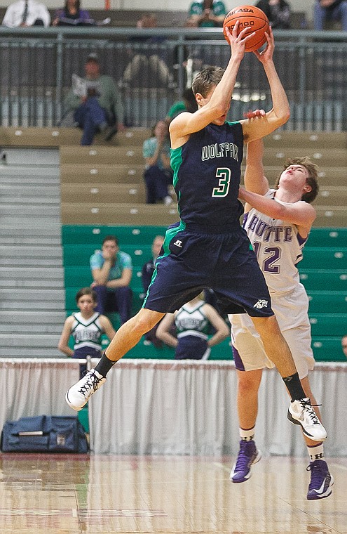 &lt;p&gt;Glacier senior guard Reid Siderius (3) pulls down a wild pass Thursday morning during Glacier's matchup against Butte in the first game of the Class AA State Championship in Great Falls. Thursday, March 7, 2013 in Great Falls, Montana. (Patrick Cote/Daily Inter Lake)&lt;/p&gt;