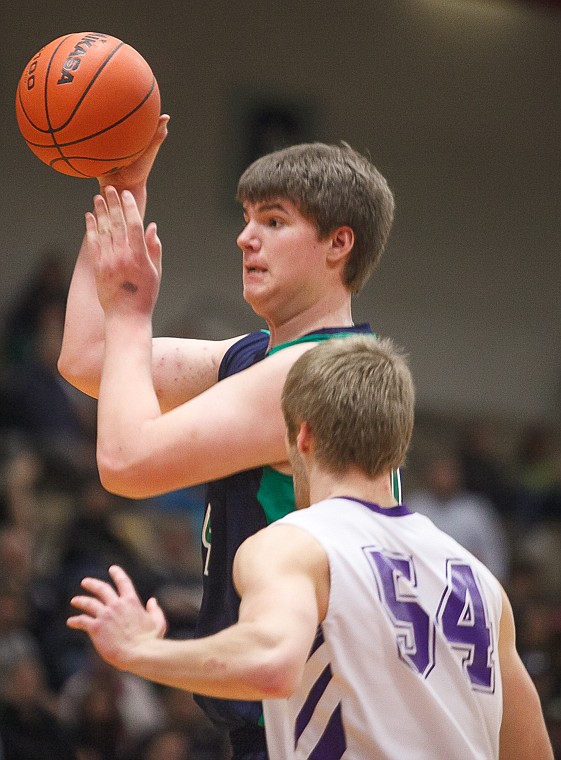 &lt;p&gt;Glacier senior post Ryan Edwards (44) looks to pass the ball Thursday morning during Glacier's matchup against Butte in the first game of the Class AA State Championship in Great Falls. Thursday, March 7, 2013 in Great Falls, Montana. (Patrick Cote/Daily Inter Lake)&lt;/p&gt;