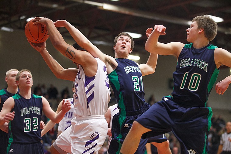 &lt;p&gt;Glacier senior forward Kalen Reed (21) battles for a rebound Thursday morning during Glacier's matchup against Butte in the first game of the Class AA State Championship in Great Falls. Thursday, March 7, 2013 in Great Falls, Montana. (Patrick Cote/Daily Inter Lake)&lt;/p&gt;