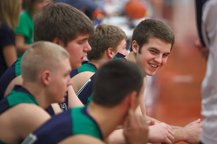 &lt;p&gt;Glacier senior forward Logan Iverson (24) on the benchThursday morning before Glacier's matchup against Butte in the first game of the Class AA State Championship in Great Falls. Thursday, March 7, 2013 in Great Falls, Montana. (Patrick Cote/Daily Inter Lake)&lt;/p&gt;