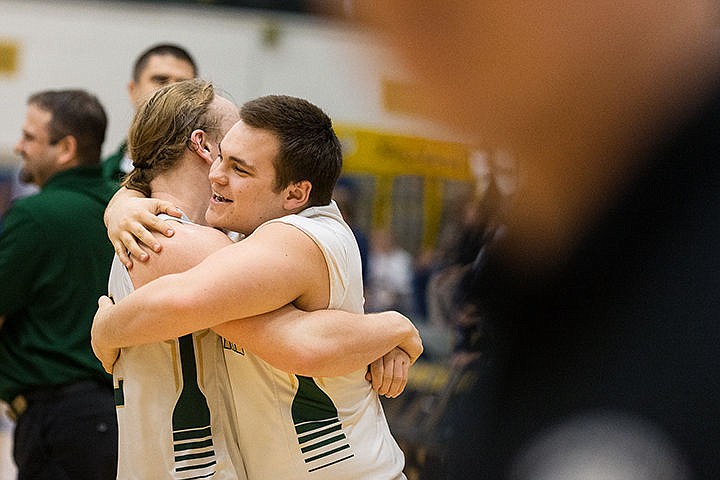 &lt;p&gt;St. Maries guard Chase Truscott hugs teammate Matthew Smith after placing third in the state 2A boys basketball tournament in Boise.&lt;/p&gt;