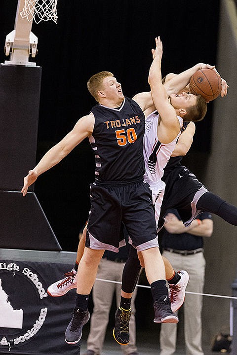 &lt;p&gt;Post Falls High&#146;s Jacob Blakney gets a hand on more than the ball while going against Highland&#146;s Connor Harding for a rebound in the first quarter.&lt;/p&gt;