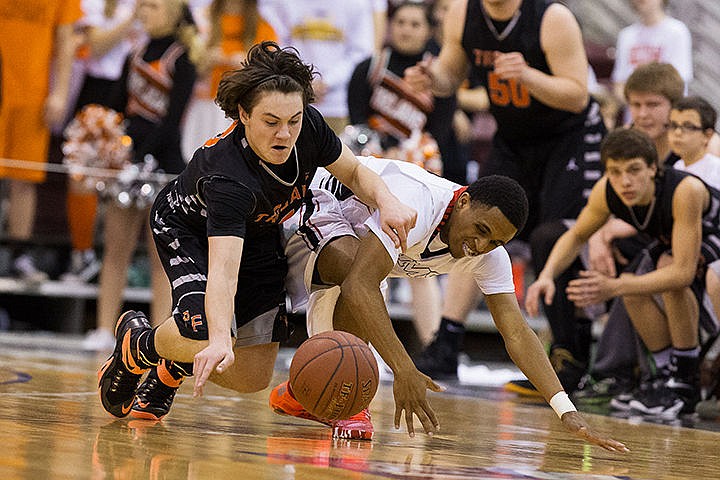 &lt;p&gt;Post Falls High&#146;s Max McCullough beats Highland&#146;s Jawan Frazier-Flores while scrambling for a loose ball in the second quarter.&lt;/p&gt;