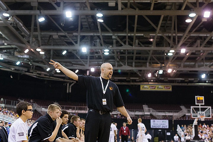 &lt;p&gt;Mike McLean, Post Falls boys basketball head coach, calls out a play from the sidelines in the fourth quarter.&lt;/p&gt;