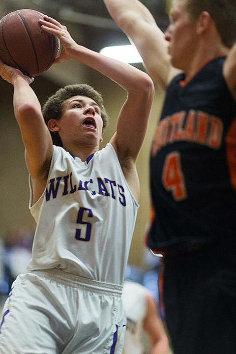 &lt;p&gt;Kellogg guard Chase Jerome (5) shoots the ball around Fruitland defender Jerred Seamons (4) second period.&lt;/p&gt;