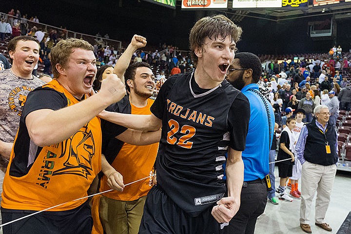 &lt;p&gt;Dalton Thompson celebrates with the student section after Post Falls High School won the state 5A boys basketball championship title game against Highland High School in overtime Saturday night at the Idaho Center in Nampa.&lt;/p&gt;