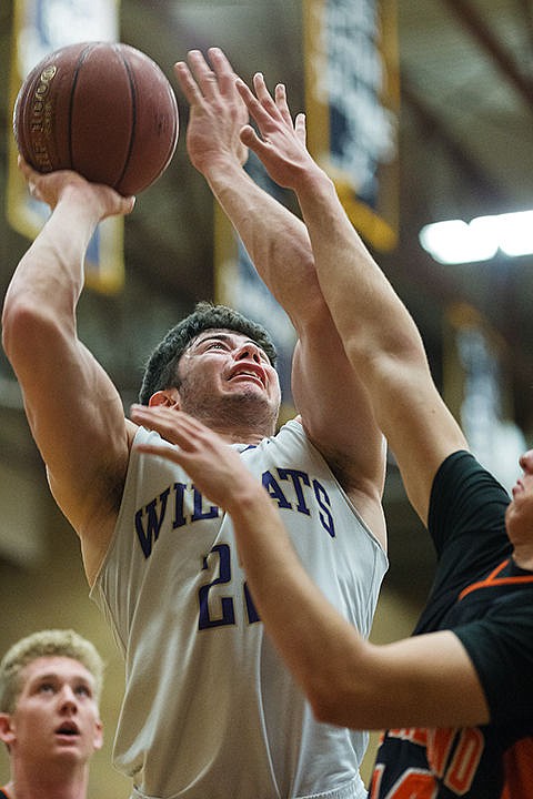 &lt;p&gt;Kellogg&#146;s Tucker Gust shots over a Fruitland defender for a first half score.&lt;/p&gt;