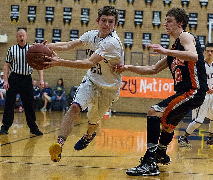 &lt;p&gt;Kellogg&#146;s Dominic Easley drives to the hoop past Fruitland High School&#146;s Walker Whaley during the third quarter.&lt;/p&gt;