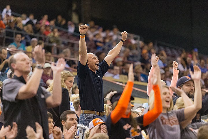 &lt;p&gt;Kyle Koski cheers for the Trojans from the Post Falls stands during the second half.&lt;/p&gt;