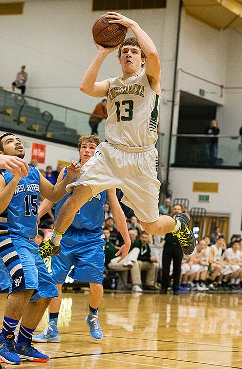 &lt;p&gt;St. Maries High&#146;s Keifer Gibson gets vertical while shooting the ball in the first half.&lt;/p&gt;