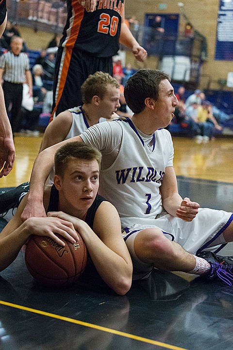 &lt;p&gt;Gus Colburn, of Kellogg High, reacts after being called for a foul on Fruitland&#146;s Wyatt Dennison after a scramble for a loose ball in final minutes.&lt;/p&gt;