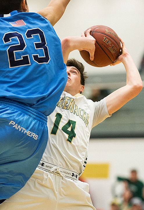 &lt;p&gt;St. Maries&#146; Jake Sieler is fouled by West Jefferson&#146;s Uriel Garcia while shooting a fading jumper in the fourth quarter.&lt;/p&gt;