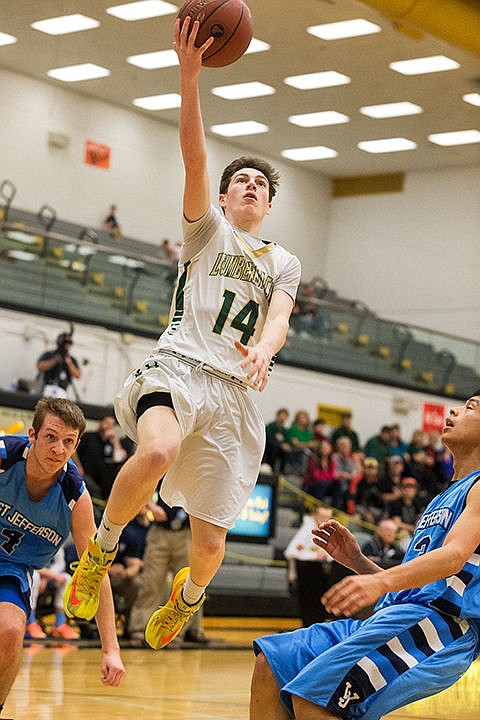 &lt;p&gt;St. Maries&#146; Jake Sieler goes up for a lay-in after driving between a pair of West Jefferson defenders during the first half.&lt;/p&gt;