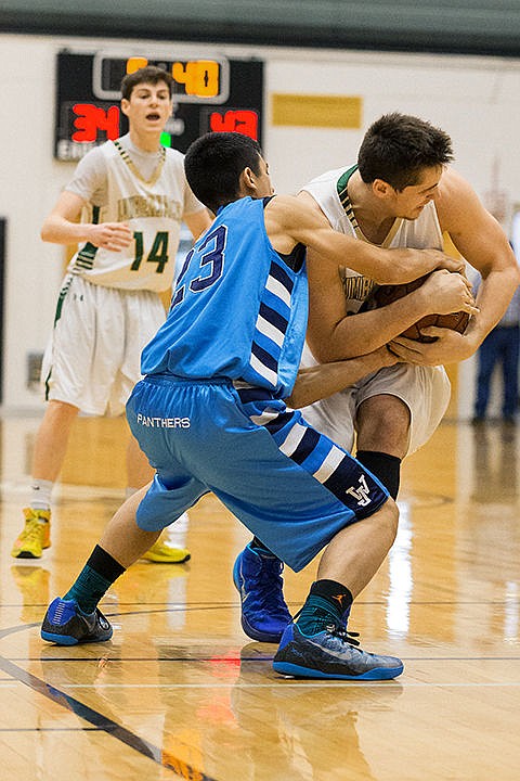 &lt;p&gt;St. Maries&#146; Logan Feasline fights for posession of the ball with West Jefferson&#146;s Uriel Garcia during the third quarter.&lt;/p&gt;