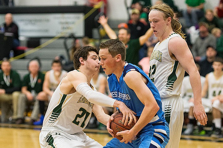 &lt;p&gt;St. Maries High&#146;s Jacob Greer disrupts a pass by West Jefferson&#146;s Benson Briggs during the state 2A tournament in Boise.&lt;/p&gt;