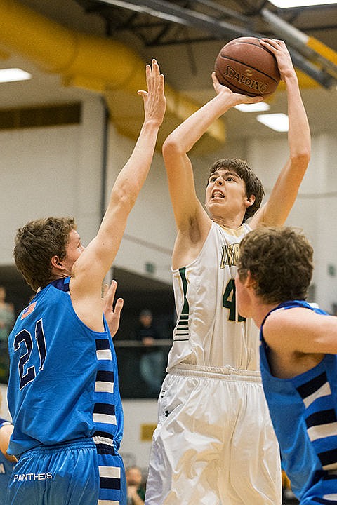 &lt;p&gt;St. Maries forward shoots the ball over West Jefferson&#146;s Connor Skidmore during the second quarter.&lt;/p&gt;