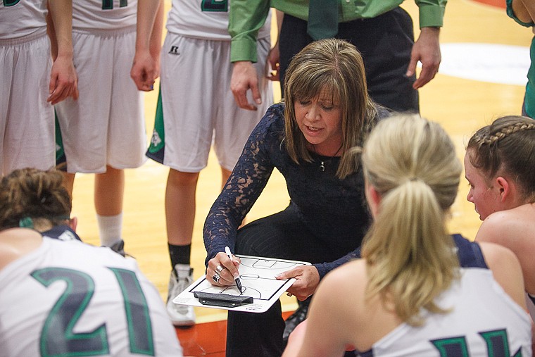 &lt;p&gt;Coach Kris Salonen draws up a play during a timeout during Glacier's matchup against Billings West on the second day of the Class AA state basketball tournament at Four Seasons Arena on Friday, March 8, 2013 in Great Falls, Montana. (Patrick Cote/Daily Inter Lake)&lt;/p&gt;