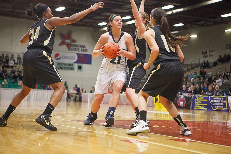 &lt;p&gt;Glacier junior center Cassidy Hashley (21) drives to the basket Friday afternoon during Glacier's matchup against Billings West on the second day of the Class AA state basketball tournament at Four Seasons Arena in Great Falls. Friday, March 8, 2013 in Great Falls, Montana. (Patrick Cote/Daily Inter Lake)&lt;/p&gt;