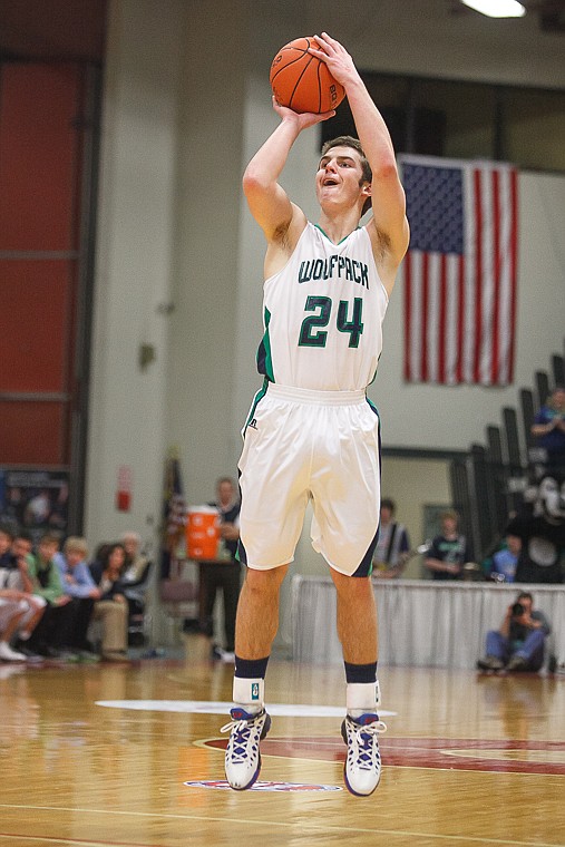 <p>Glacier senior forward Logan Iverson (24) shoots the ball Friday afternoon during Glacier's matchup against Hellgate on the second day of the Class AA state basketball tournament at Four Seasons Arena in Great Falls. Friday, March 8, 2013 in Great Falls, Montana. (Patrick Cote/Daily Inter Lake)</p>
