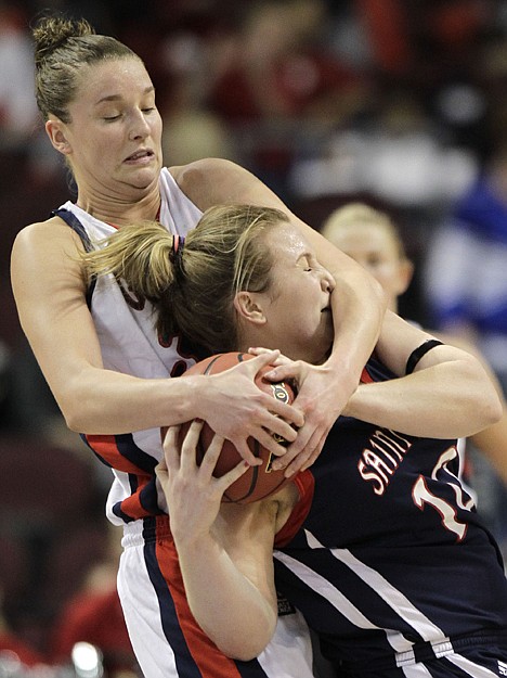 &lt;p&gt;Gonzaga's Kayla Standish, left, fouls St. Mary's guard Kate Gaze in the first half of the West Coast Conference tournament title game, Monday in Las Vegas.&lt;/p&gt;