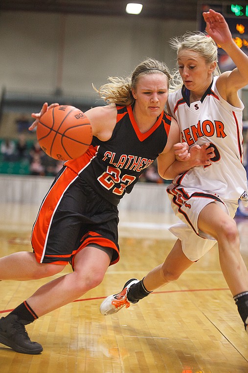 &lt;p&gt;Flathead senior Jessika Abbrescia (22) drives past a defender Friday afternoon during Flathead's matchup against Billings Senior on the second day of the Class AA state basketball tournament at Four Seasons Arena in Great Falls. Friday, March 8, 2013 in Great Falls, Montana. (Patrick Cote/Daily Inter Lake)&lt;/p&gt;