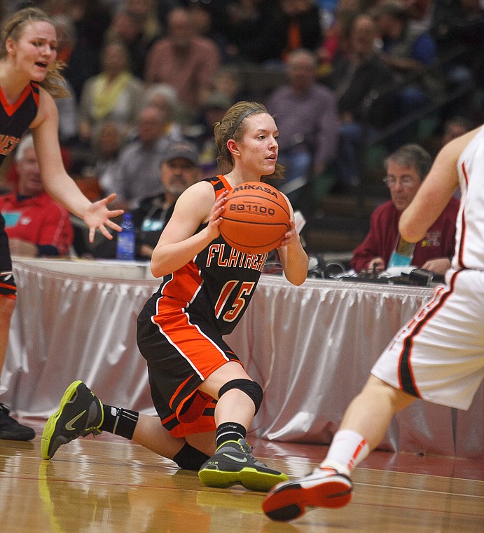 &lt;p&gt;Flathead senior Emily Russell (15) looks for an open teammate to pass to after recovering a loose ball Friday afternoon during Flathead's matchup against Billings Senior on the second day of the Class AA state basketball tournament at Four Seasons Arena in Great Falls. Friday, March 8, 2013 in Great Falls, Montana. (Patrick Cote/Daily Inter Lake)&lt;/p&gt;