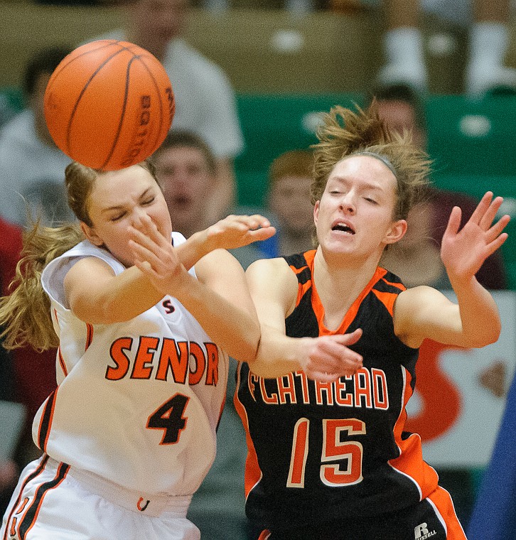 &lt;p&gt;Flathead senior Emily Russell (15) knocks a ball loose Friday afternoon during Flathead's matchup against Billings Senior on the second day of the Class AA state basketball tournament at Four Seasons Arena in Great Falls. Friday, March 8, 2013 in Great Falls, Montana. (Patrick Cote/Daily Inter Lake)&lt;/p&gt;