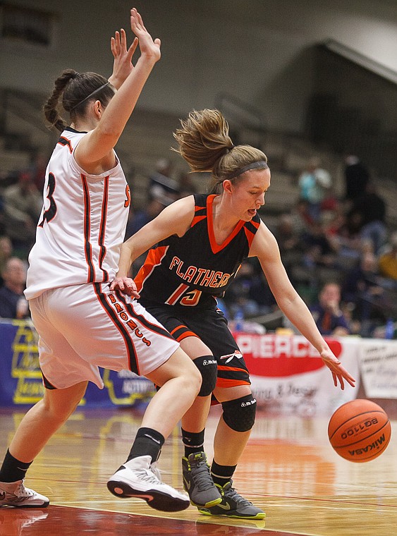 &lt;p&gt;Flathead senior Emily Russell (15) drives to the basket Friday afternoon during Flathead's matchup against Billings Senior on the second day of the Class AA state basketball tournament at Four Seasons Arena in Great Falls. Friday, March 8, 2013 in Great Falls, Montana. (Patrick Cote/Daily Inter Lake)&lt;/p&gt;