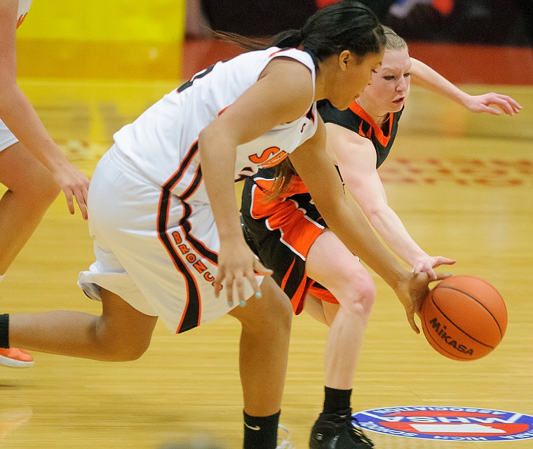 &lt;p&gt;Flathead senior Dani Davis (11) tips a ball away Friday afternoon during Flathead's matchup against Billings Senior on the second day of the Class AA state basketball tournament at Four Seasons Arena in Great Falls. Friday, March 8, 2013 in Great Falls, Montana. (Patrick Cote/Daily Inter Lake)&lt;/p&gt;