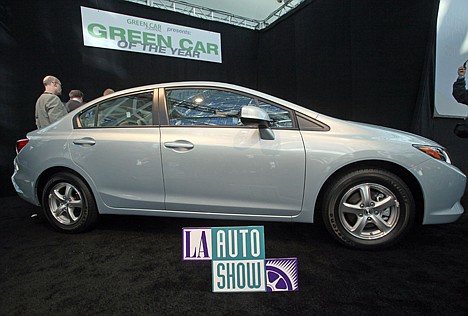 &lt;p&gt;FILE - In this Nov. 17, 2011 file photo, the 2012 Honda Civic Natural Gas car, named Green Car of the Year for 2012, is displayed after its unveiling at press preview day for the Los Angeles Auto Show. Fill 'er up _ with natural gas. High pump prices are encouraging GM and Chrysler to roll out pickups that run on natural gas, which is plentiful and cheap in the U.S.. Here's a look at what models are coming, what's already out there and where to go to fill up. (AP Photo/Reed Saxon, File)&lt;/p&gt;