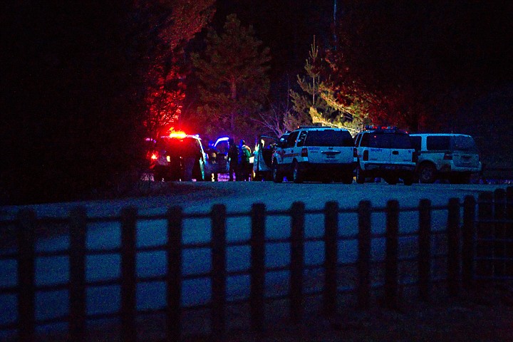 &lt;p&gt;Law enforcement personnel block the entrance to Hayden Creek Road as they conduct a search with a helicopter for a shooting suspect Tuesday evening.&lt;/p&gt;