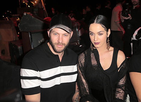 &lt;p&gt;Stylist Johnny Wujek, left, and singer Katy Perry attend Givenchy's ready to wear fall-winter 2015-2016 fashion collection during Paris Fashion Week on Sunday in Paris.&#160;&lt;/p&gt;