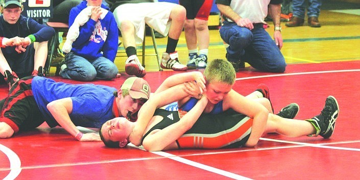 Jake Lapinski works to get his opponent in a hold during a match last Thursday.